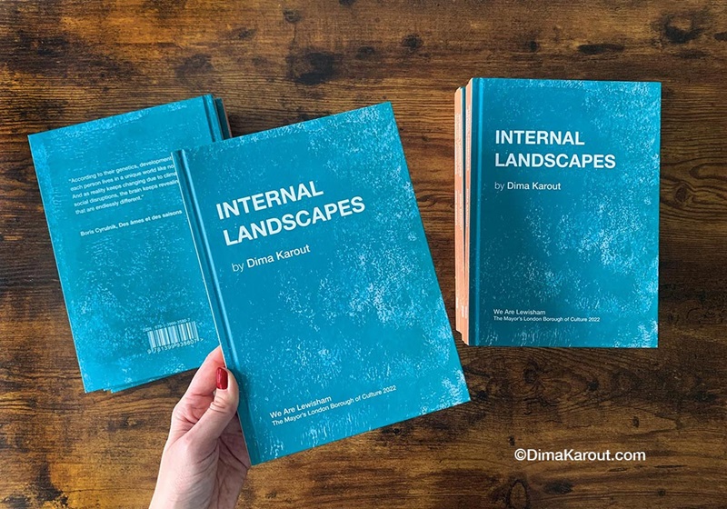 Three Internal Landscapes books on table