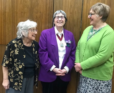 Councillor Chris Best laughing with two residents from the Lewisham Pensioners Forum