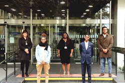 Christina Norman, Femi Komolafe, Aaliyah Odedina, Councillor Andre Bourne and Angella Billy standing at the steps of the Civic Suite two-meters apart from each other. 