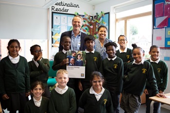 Cllr Chris Barnham with Headteacher Lisa Williams and pupils of Rushey Green Primary School