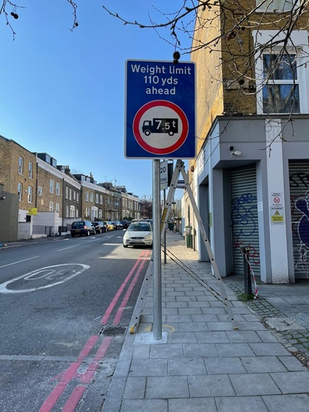 This photo shows the signage indicating the approach to the weight restriction at Florence Road junction with New Cross Road.