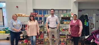 Damien Egan with volunteers at the Evelyn Community Store 