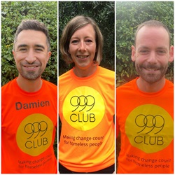 Damien Egan, Kate Greenwood, and David McCollum in orange t.shirts with the 999 Club logo on them.