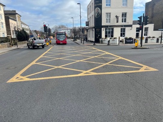 image of a yellow box junction on kent house road