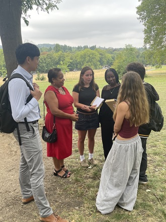 Brenda Dacres, Mayor of Lewisham and Cllr Edison Huynh, Cabinet Member for Children and Young People, speaking with a group of A-level students finding out their results at Prendergast School.
