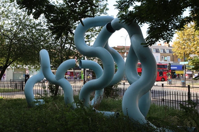 Aqua blue, curvy sculpture, Waterline