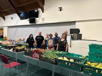A group of people at a food pantry