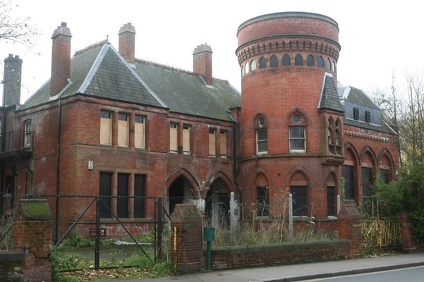An image of the Ladywell Play Tower with boarded windows