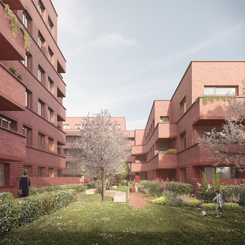 Red brick apartment building with green area
