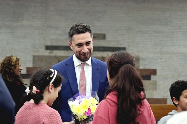 The Mayor of Lewisham, Damien Egan, with a refugee family resettled in Lewisham