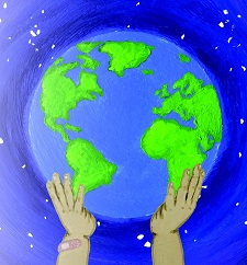 A young child's hands holding a globe, illustrating the concept of the religious education syllabus for key stages 1 and 2